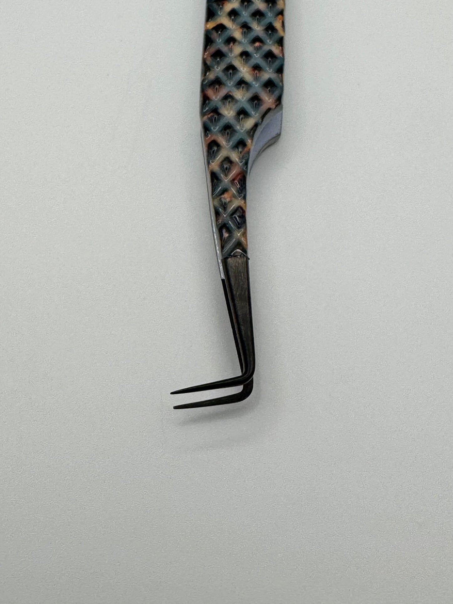Discolored Volume Tweezers